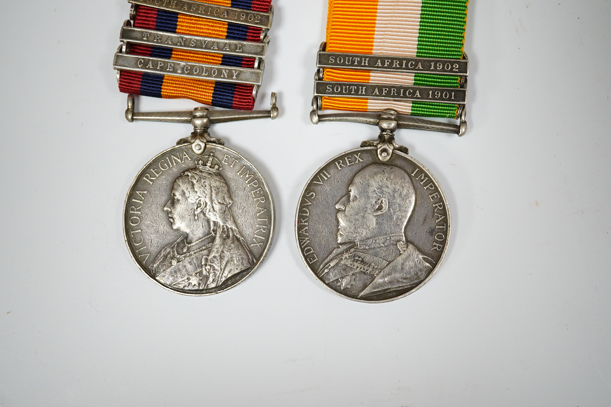 A Queen's South Africa & King's South Africa group of two with SA 1902, Traans and CC/ SA1901 and 1902 clasps to 5519 Pte E.Comber Middlesex Regt